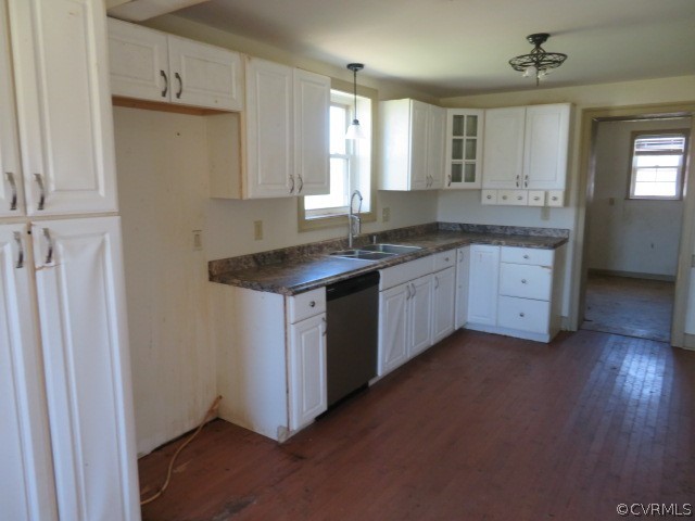 15212 Wilkinson Road Dinwiddie, VA 23841 - Photo 26 of 46 a kitchen with a sink stove and cabinets