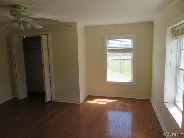 15212 Wilkinson Road Dinwiddie, VA 23841 - Photo 42 of 46 an empty room with wooden floor and windows