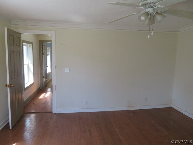 15212 Wilkinson Road Dinwiddie, VA 23841 - Photo 44 of 46 a view of an empty room with wooden floor and a window