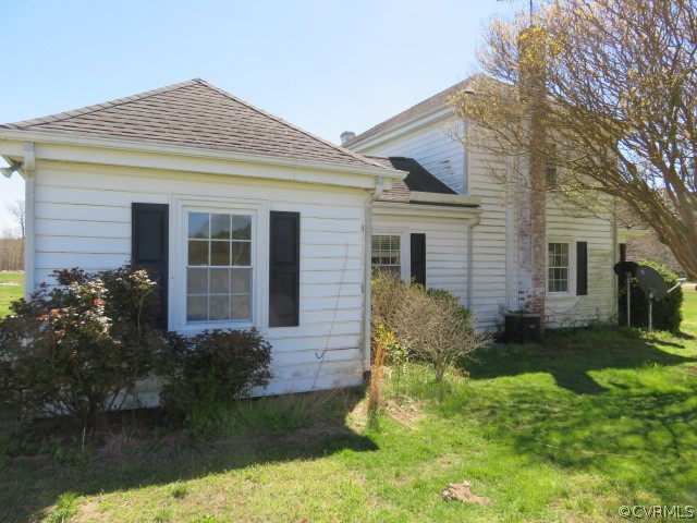 15212 Wilkinson Road Dinwiddie, VA 23841 - Photo 5 of 46 a view of a house with a yard and plants