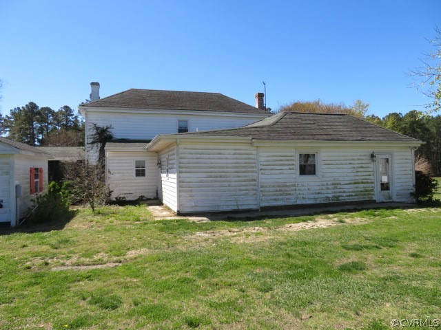 15212 Wilkinson Road Dinwiddie, VA 23841 - Photo 6 of 46 a view of a house with a yard