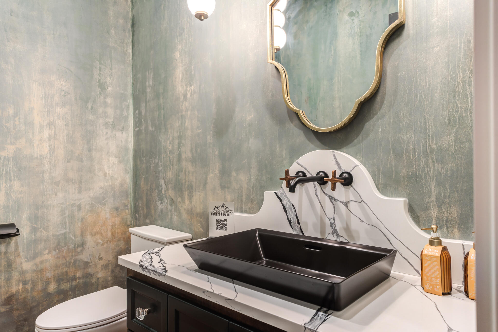 4510 Zadar Avenue Lubbock, TX 79407 - Photo 117 of 142 a bathroom with a sink a toilet and a mirror