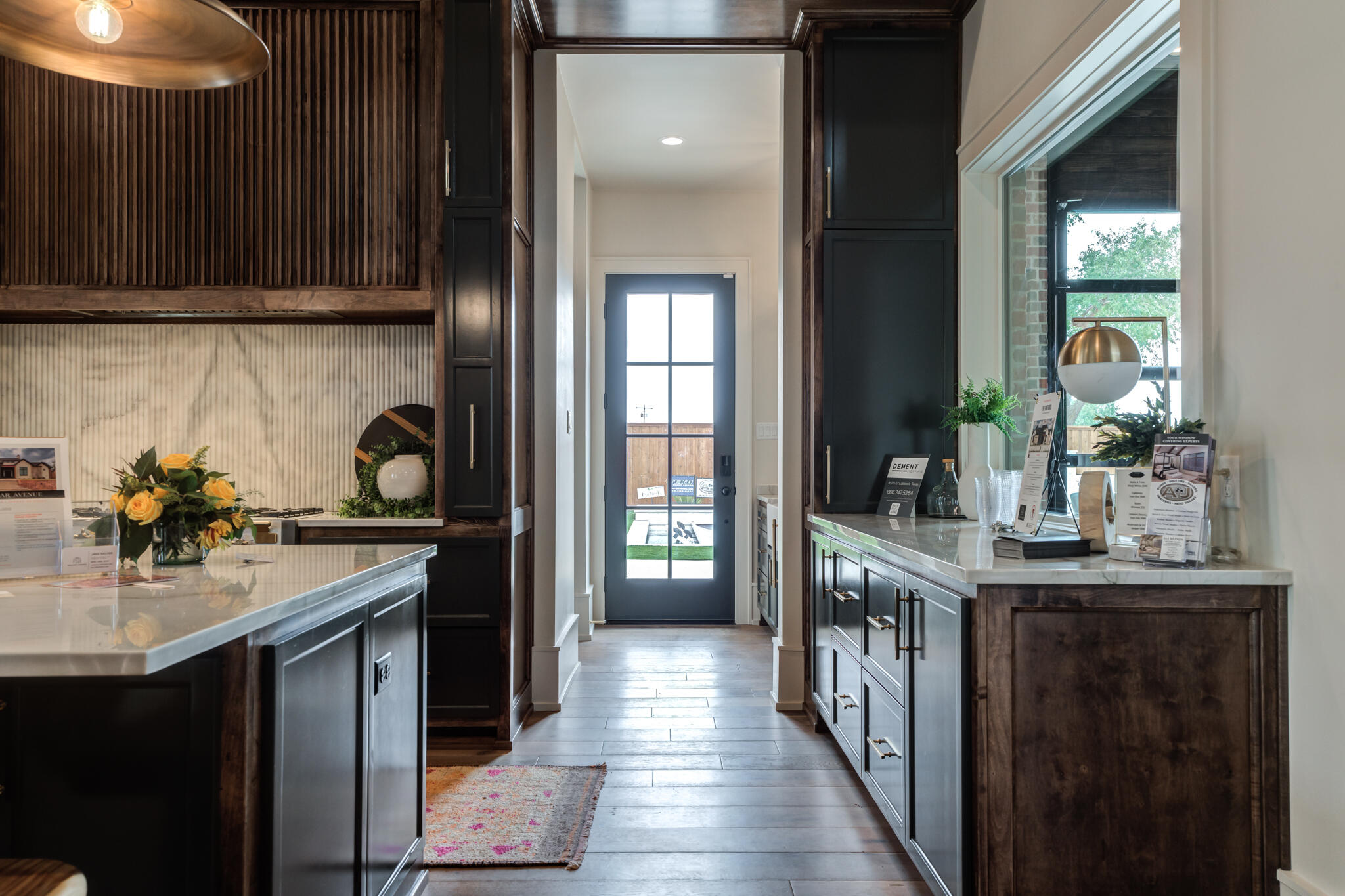 4510 Zadar Avenue Lubbock, TX 79407 - Photo 39 of 142 a kitchen with kitchen island granite countertop a sink stove and cabinets