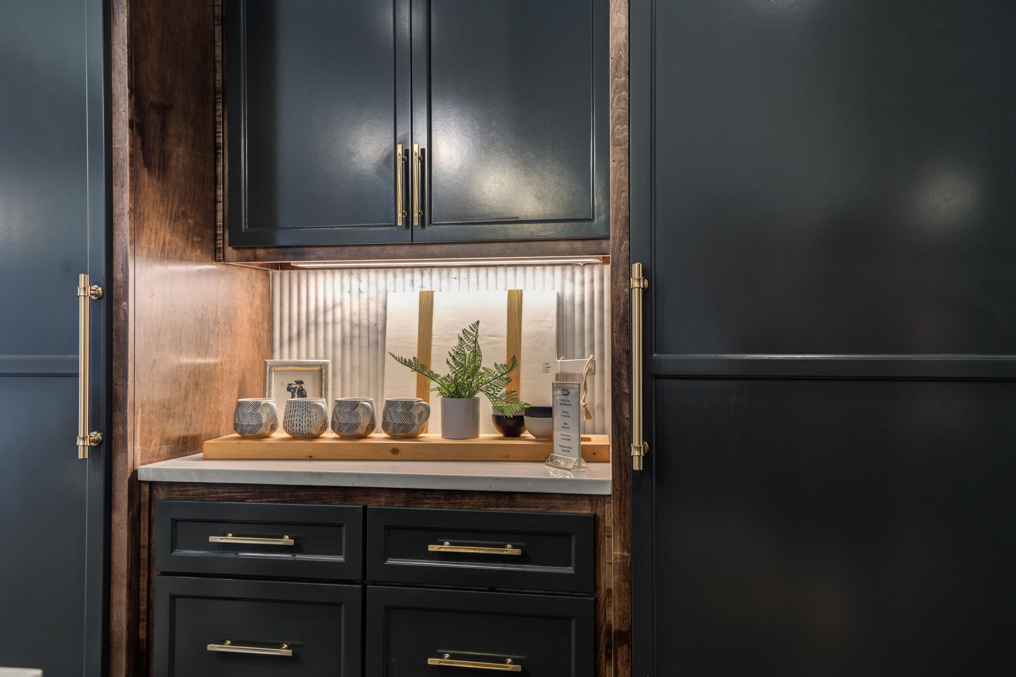 4510 Zadar Avenue Lubbock, TX 79407 - Photo 46 of 142 a kitchen with a sink and a large mirror next to a window
