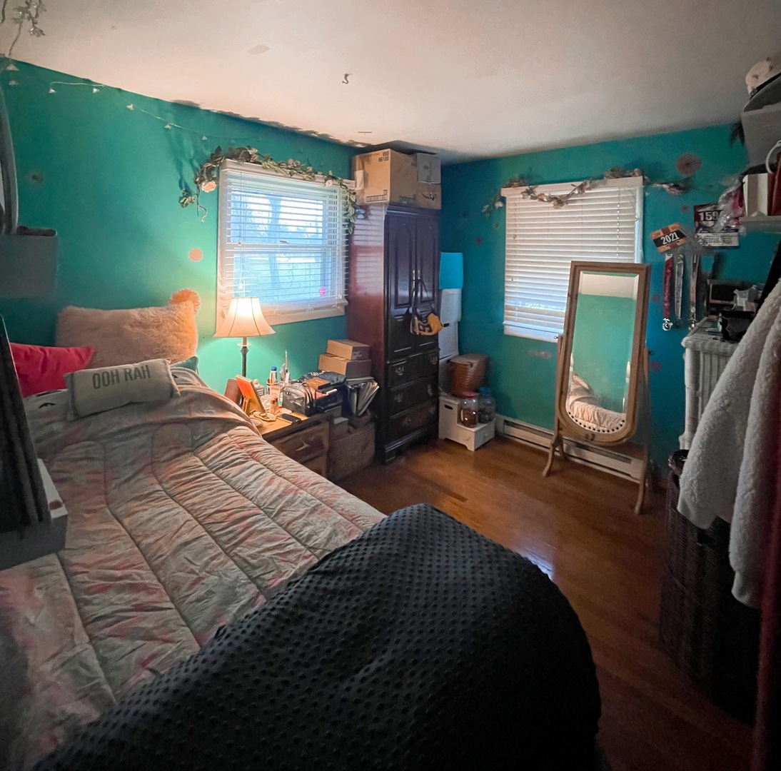 3214 Stieg Road Woodstock, IL 60098 - Photo 11 of 20 a bedroom with furniture and a window