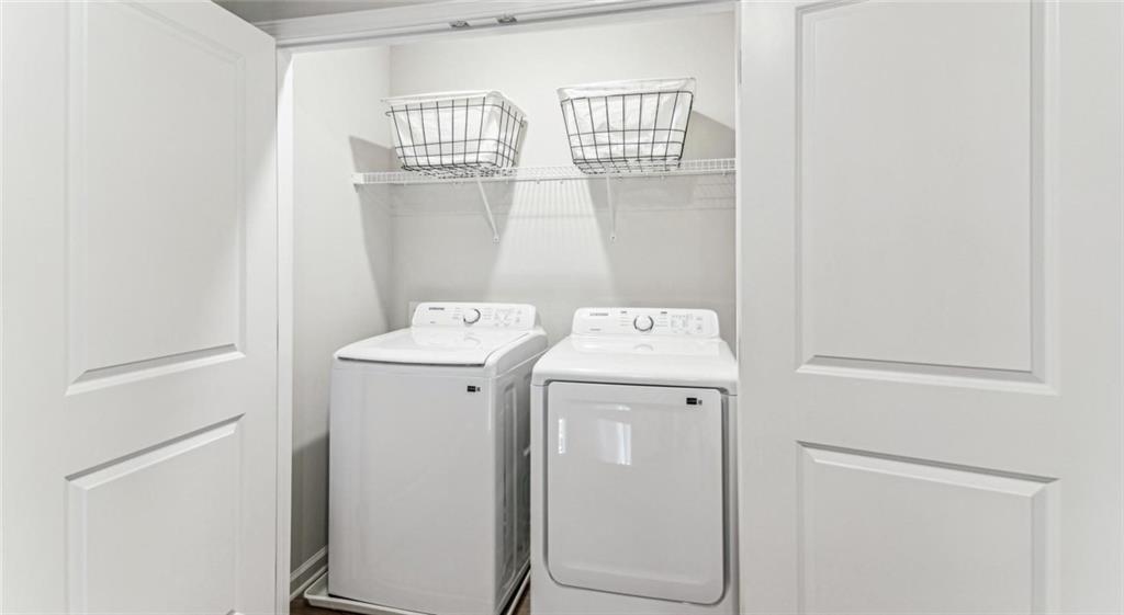 10 Bridgestone Circle, Unit B1 Conyers, GA 30013 - Photo 17 of 25 a utility room with dryer and washer