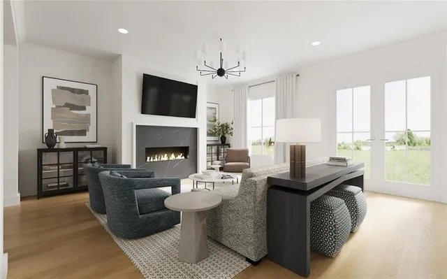 a view of a livingroom with furniture window and a fireplace