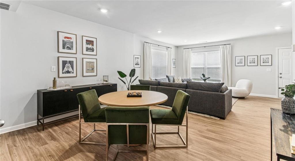 10 Bridgestone Circle, Unit B1 Conyers, GA 30013 - Photo 4 of 25 a living room with furniture and wooden floor