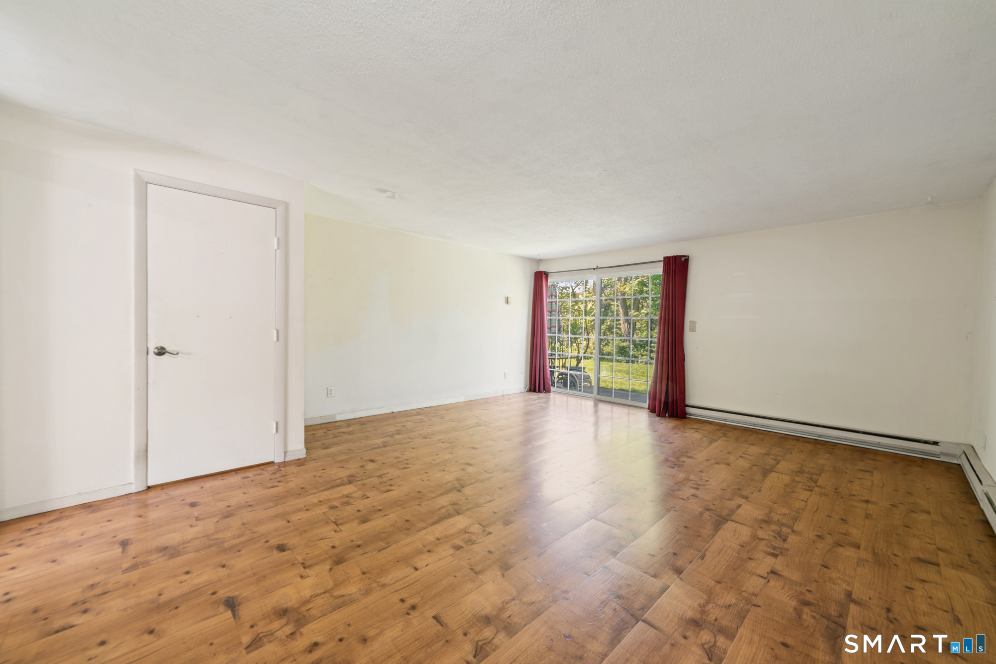 55 Porter Avenue, Unit 6E Naugatuck, CT 06770 - Photo 11 of 29 a view of an empty room with a window