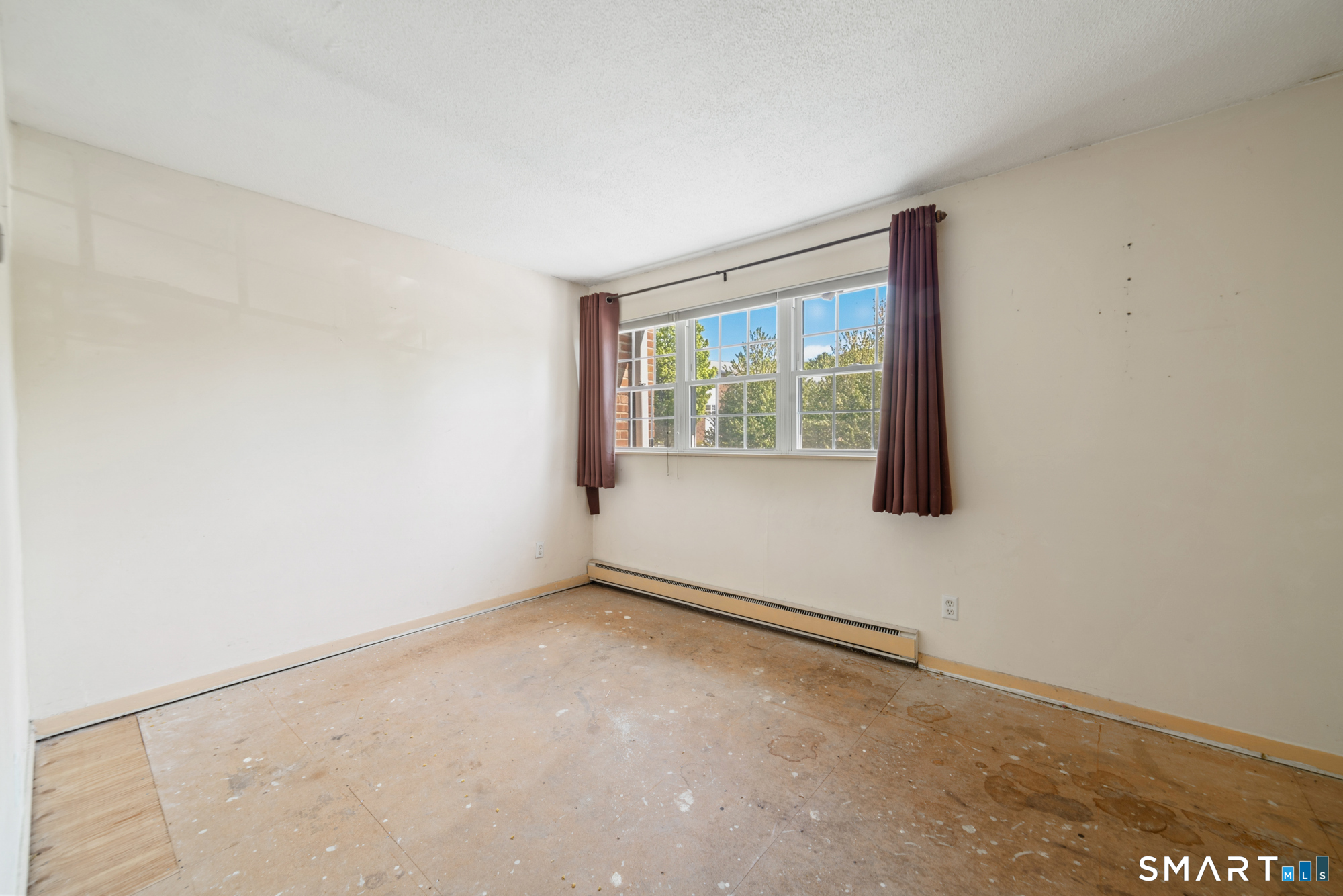 55 Porter Avenue, Unit 6E Naugatuck, CT 06770 - Photo 17 of 29 an empty room with windows