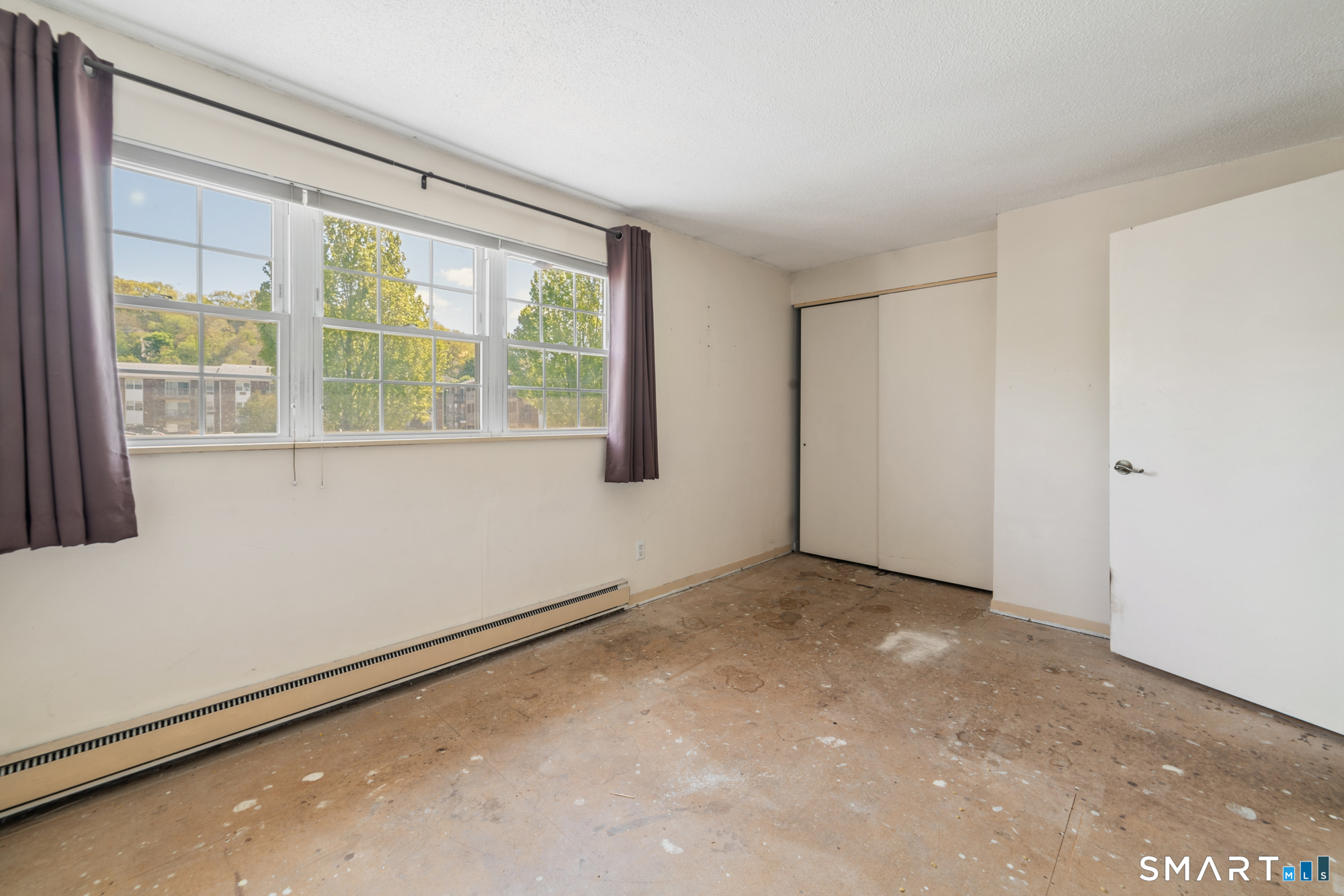 55 Porter Avenue, Unit 6E Naugatuck, CT 06770 - Photo 18 of 29 an empty room with a window