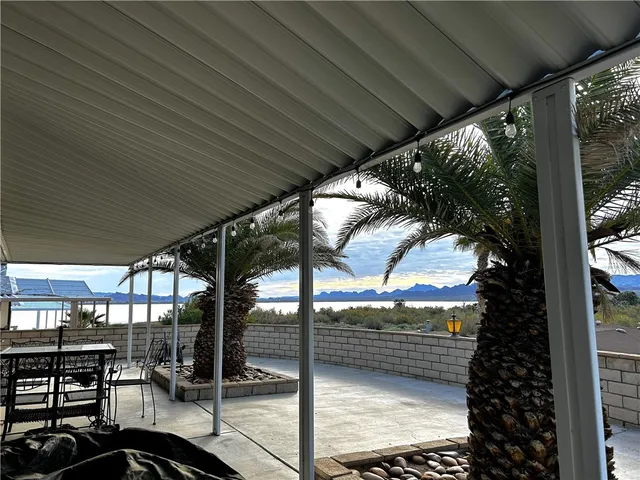 a view of swimming pool with a patio