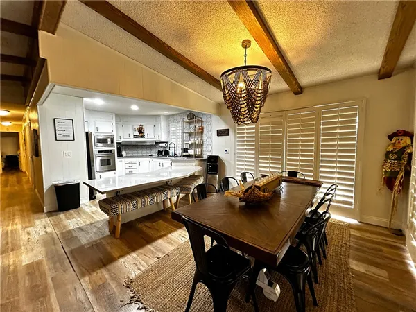 a view of a dining room with furniture