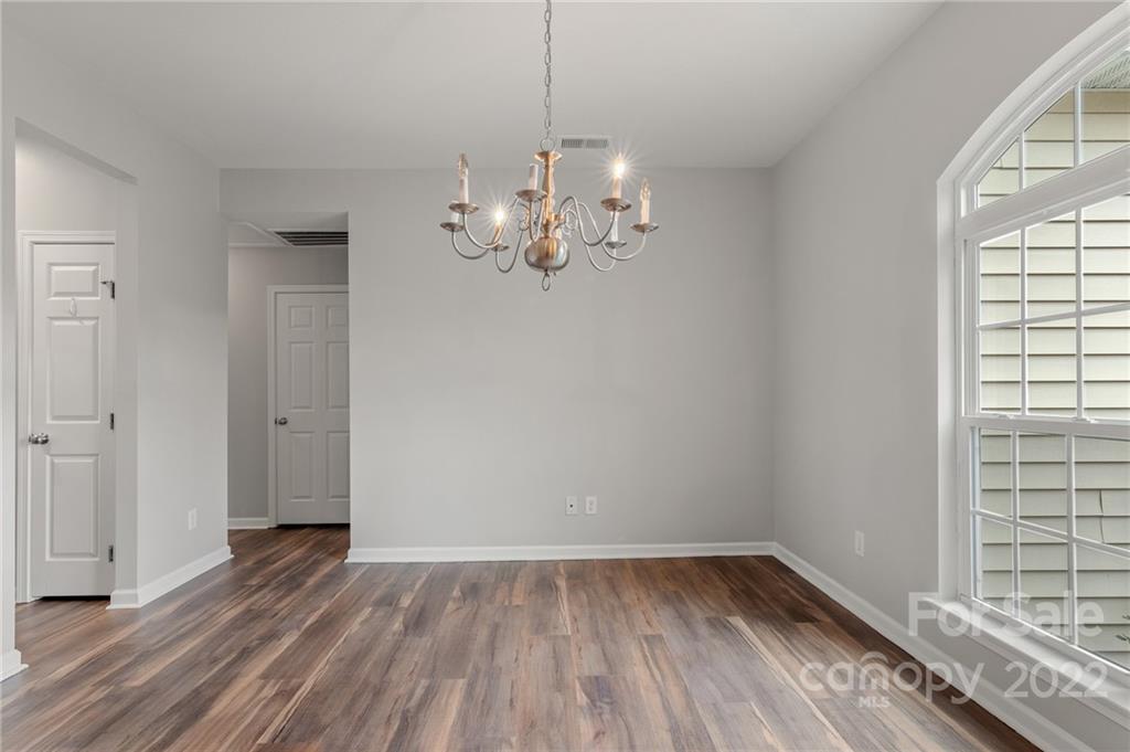 272 Lorraine Road Fort Mill, SC 29708 - Photo 12 of 42 a view of a room with wooden floor and window