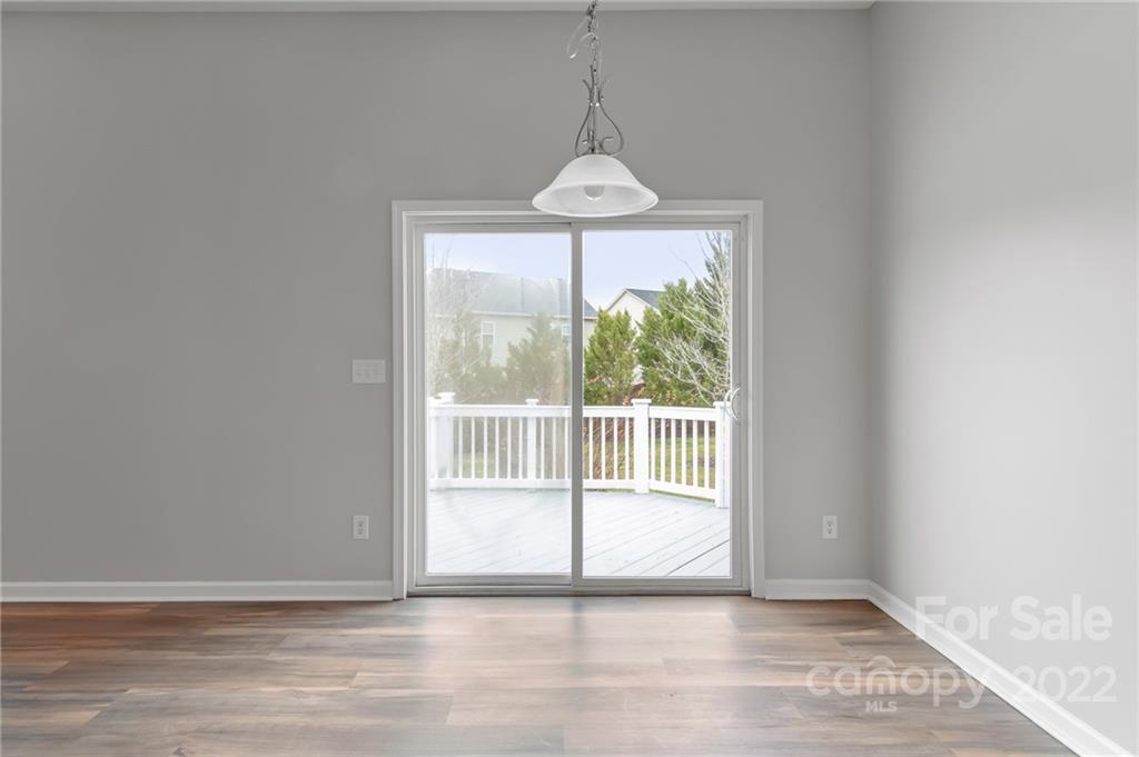 272 Lorraine Road Fort Mill, SC 29708 - Photo 18 of 42 a view of a room with wooden floor and a window