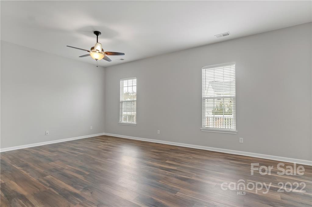 272 Lorraine Road Fort Mill, SC 29708 - Photo 21 of 42 wooden floor in an empty room with a window