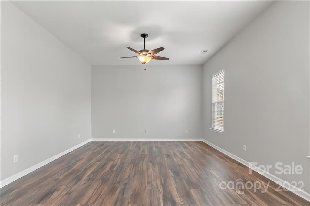 272 Lorraine Road Fort Mill, SC 29708 - Photo 22 of 42 wooden floor in an empty room with a window