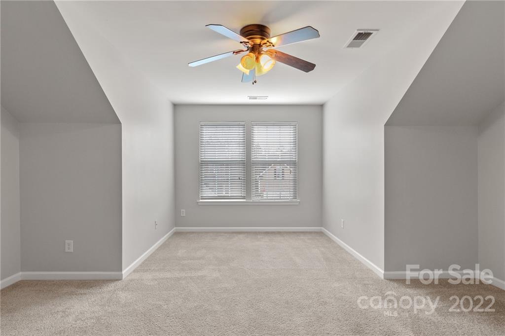 272 Lorraine Road Fort Mill, SC 29708 - Photo 3 of 42 a view of an empty room with a window