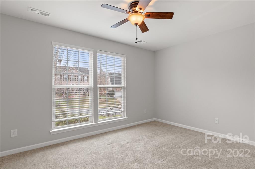 272 Lorraine Road Fort Mill, SC 29708 - Photo 38 of 42 an empty room with a window and a fan
