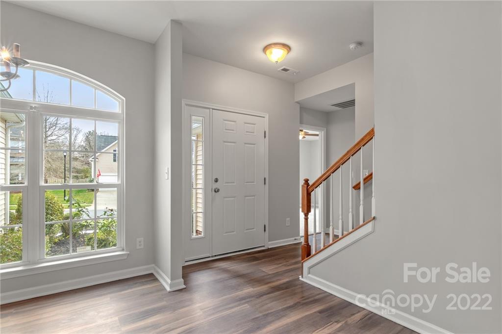 272 Lorraine Road Fort Mill, SC 29708 - Photo 9 of 42 a view of an entryway with wooden floor