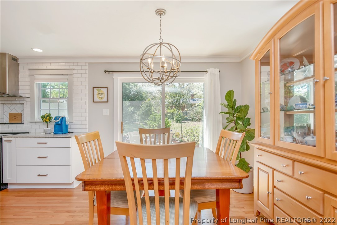2611 Huntington Road Fayetteville, NC 28303 - Photo 15 of 33 a view of a dining room with furniture window and outside view