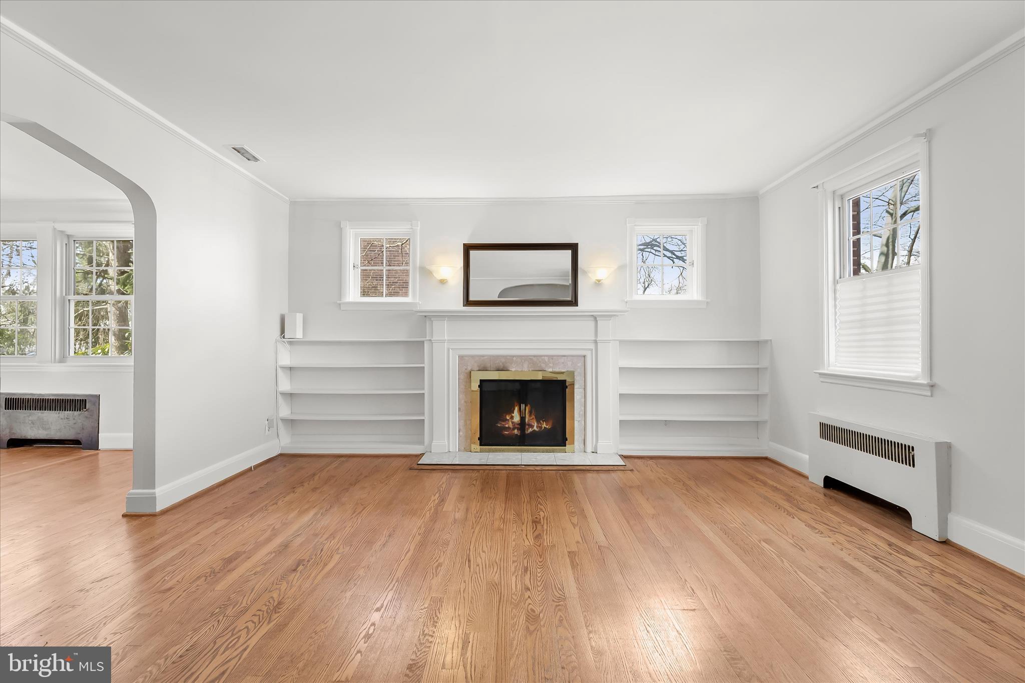 67 Dunkirk Road Baltimore, MD 21212 - Photo 8 of 57 a view of a livingroom with furniture and a fireplace