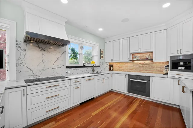 a view of a water heater and a floor to ceiling window