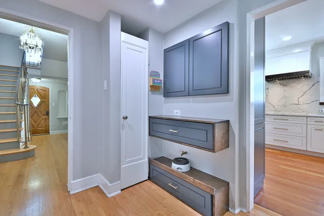 a view of a balcony with couch and wooden floor