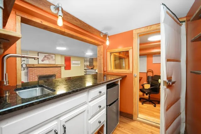 a view of backyard with seating space