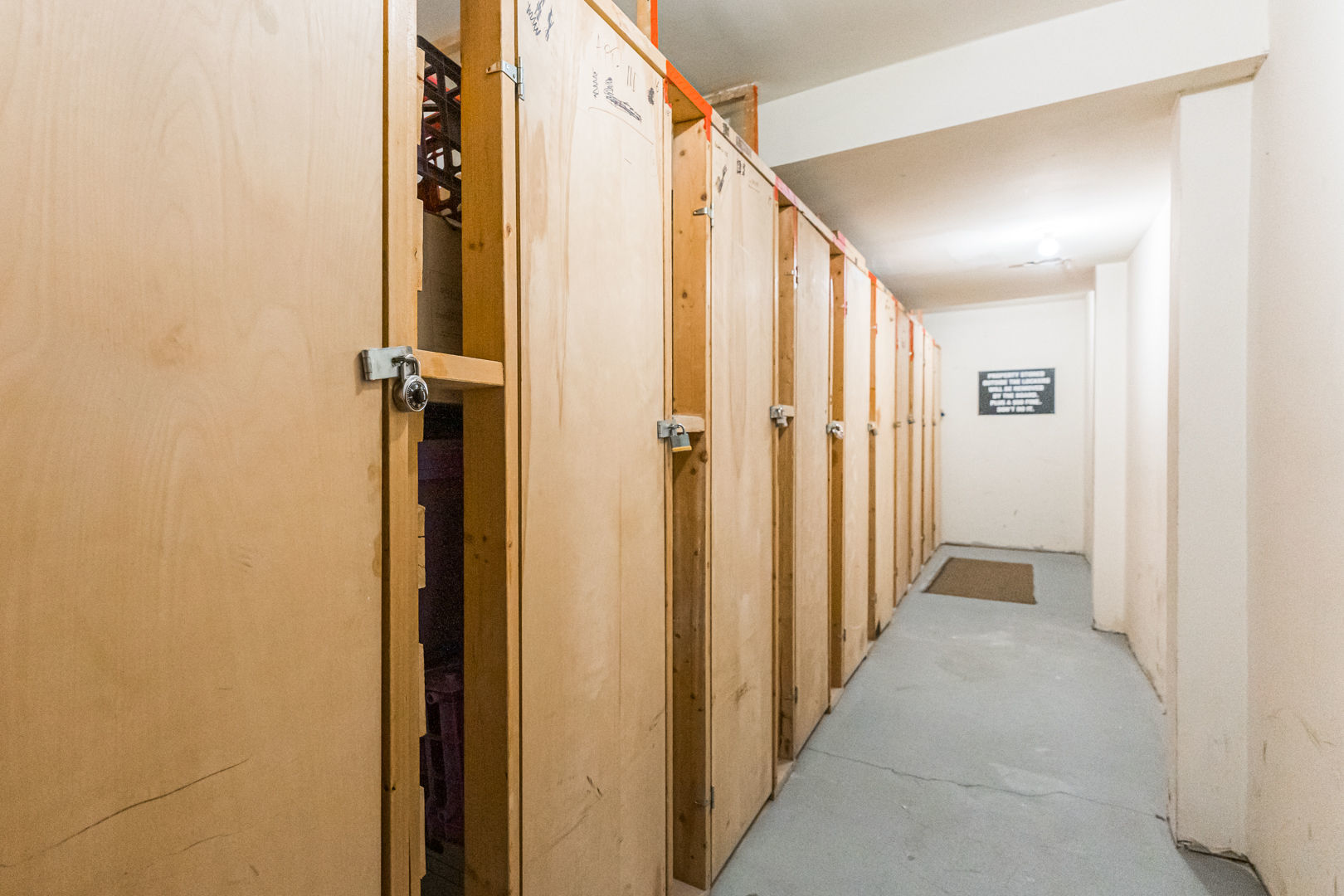 625 West Huntington Commons Road, Unit 106 Mount Prospect, IL 60056 - Photo 11 of 17 a view of a hallway with wooden floor