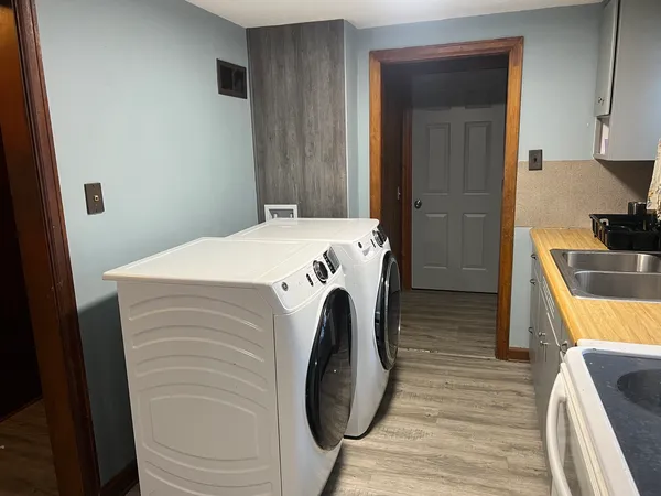 a utility room with dryer and washer