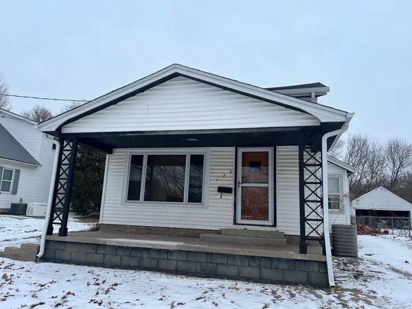 a front view of a house with entryway