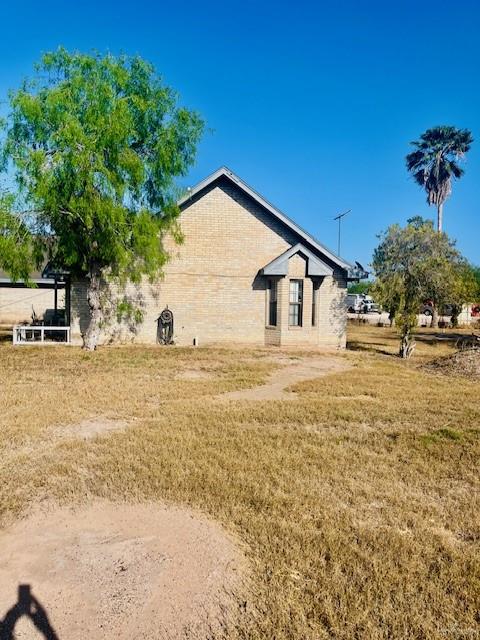 1615 Nolana Road Donna, TX 78537 - Photo 6 of 9 a view of a house with a yard