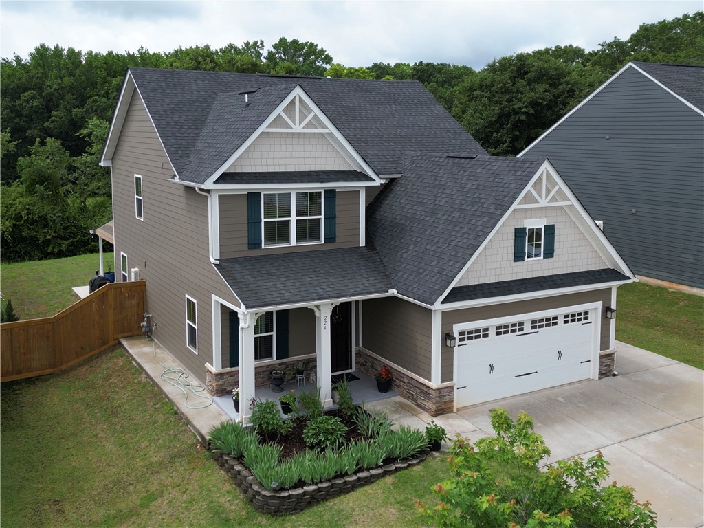 224 Bronson Ridge Anderson, SC 29621 - Photo 24 of 42 An inviting exterior with a manicured front garden and convenient attached garage.