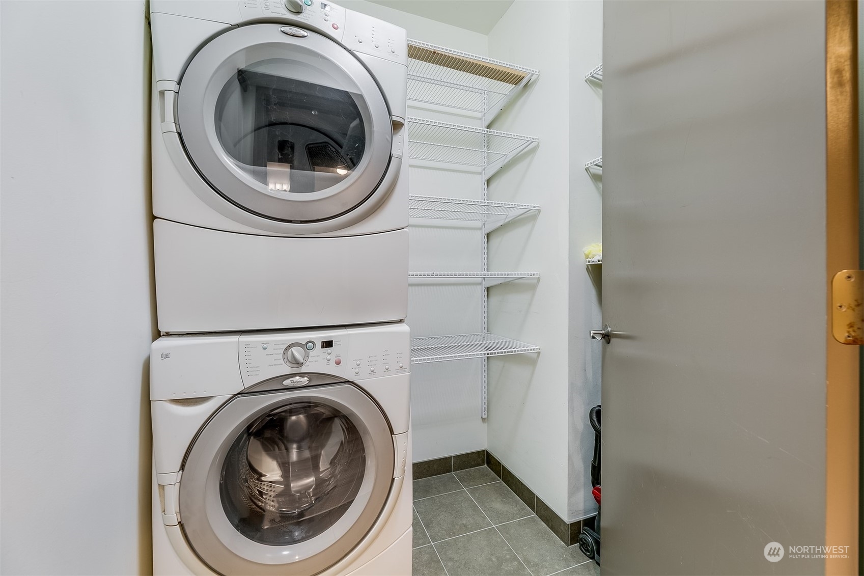 2033 2nd Avenue, Unit 101 Seattle, WA 98121 - Photo 24 of 37 a utility room with dryer and washer