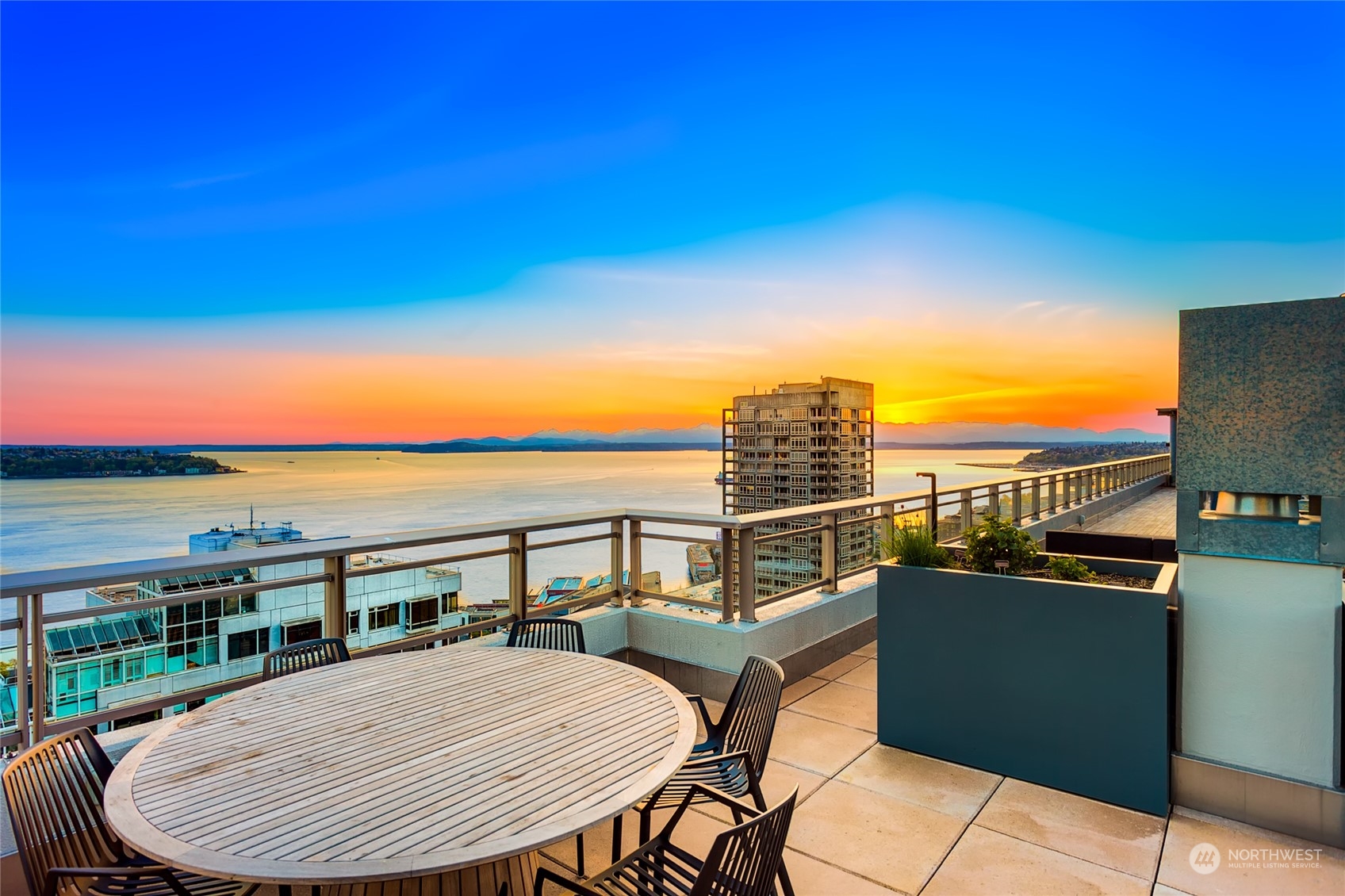 2033 2nd Avenue, Unit 101 Seattle, WA 98121 - Photo 28 of 37 a view of a balcony with furniture