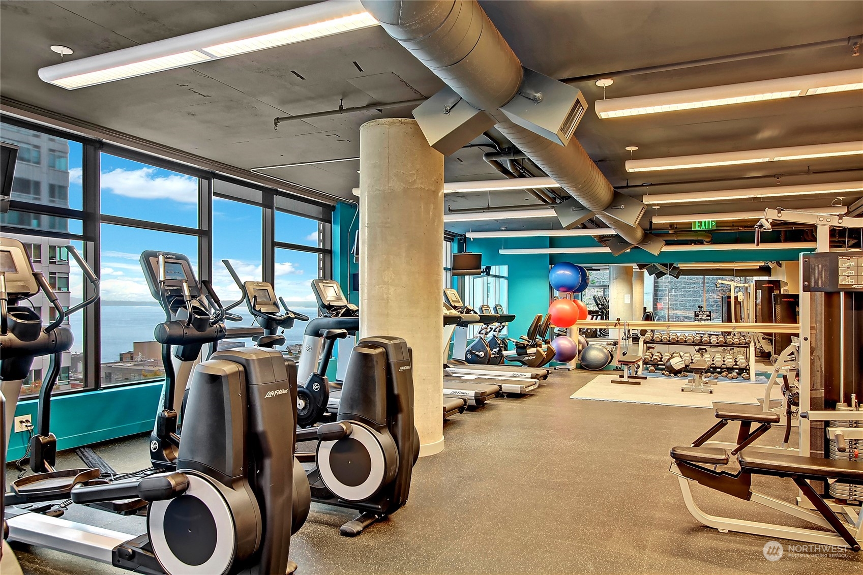2033 2nd Avenue, Unit 101 Seattle, WA 98121 - Photo 29 of 37 a view of a room with gym equipment
