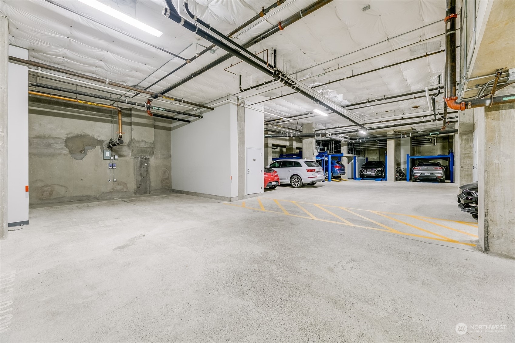 2033 2nd Avenue, Unit 101 Seattle, WA 98121 - Photo 36 of 37 a view of a garage with the shops