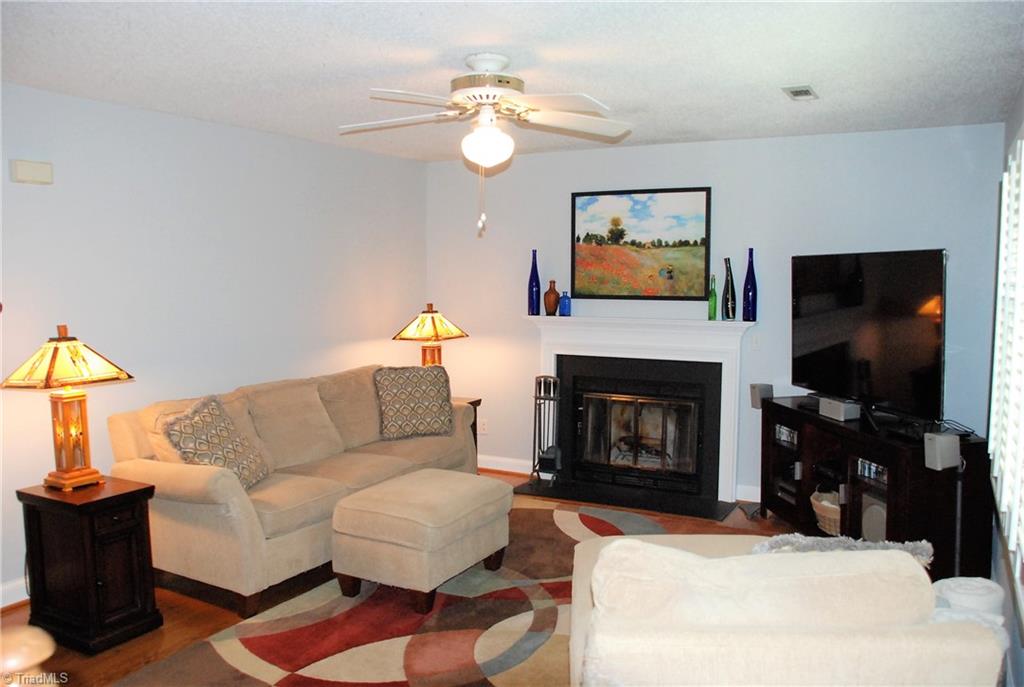 840 Laverton Lane Rural Hall, NC 27045 - Photo 3 of 17 Living with wood burning fireplace