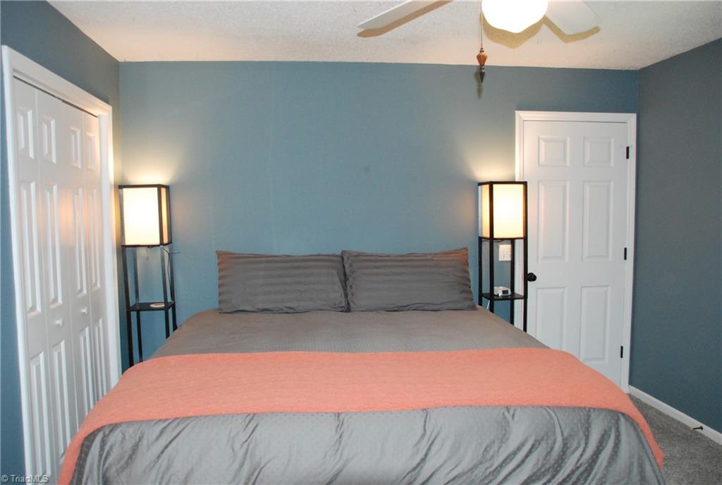 840 Laverton Lane Rural Hall, NC 27045 - Photo 9 of 17 Main level primary bedroom