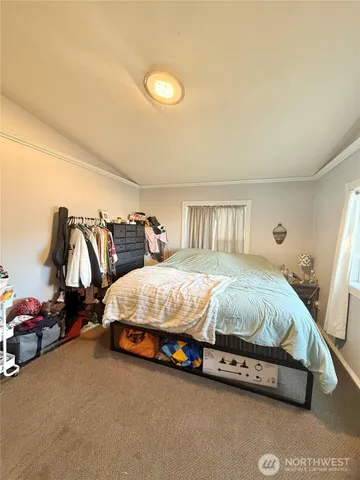 a bathroom with a sink toilet and mirror