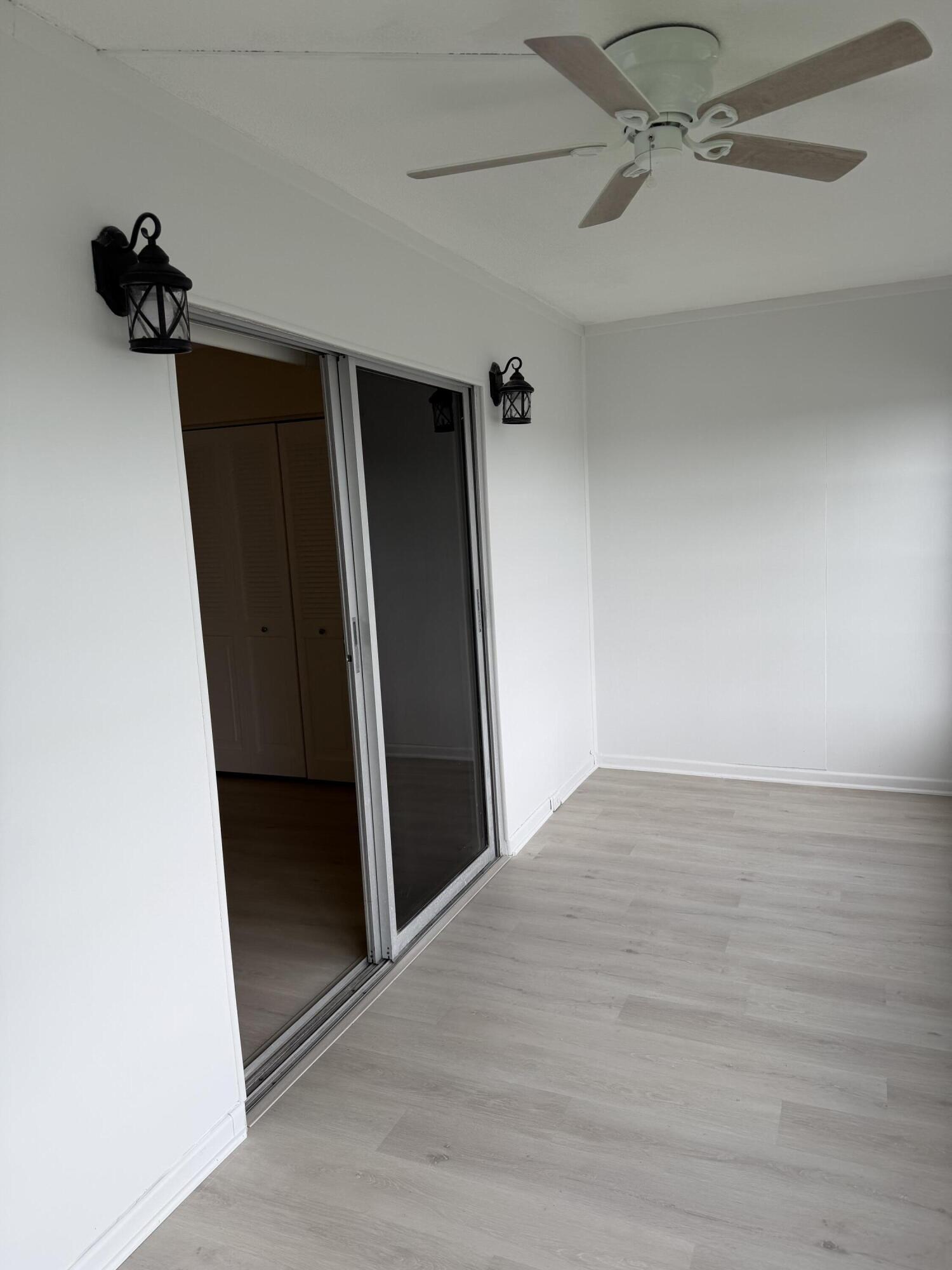 4067 Yarmouth C Boca Raton, FL 33434 - Photo 29 of 39 wooden floor in an empty room