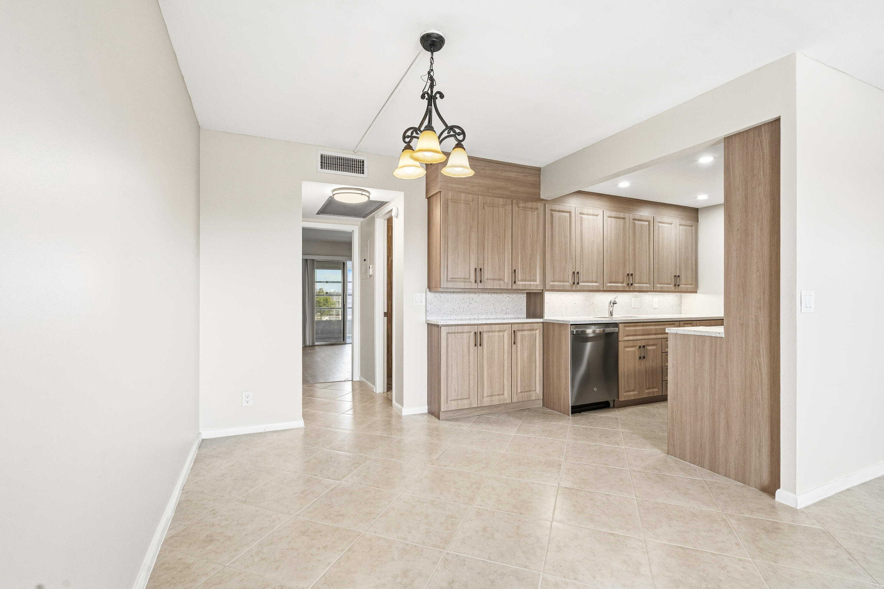 4067 Yarmouth C Boca Raton, FL 33434 - Photo 8 of 39 a view of a kitchen with a sink and cabinet