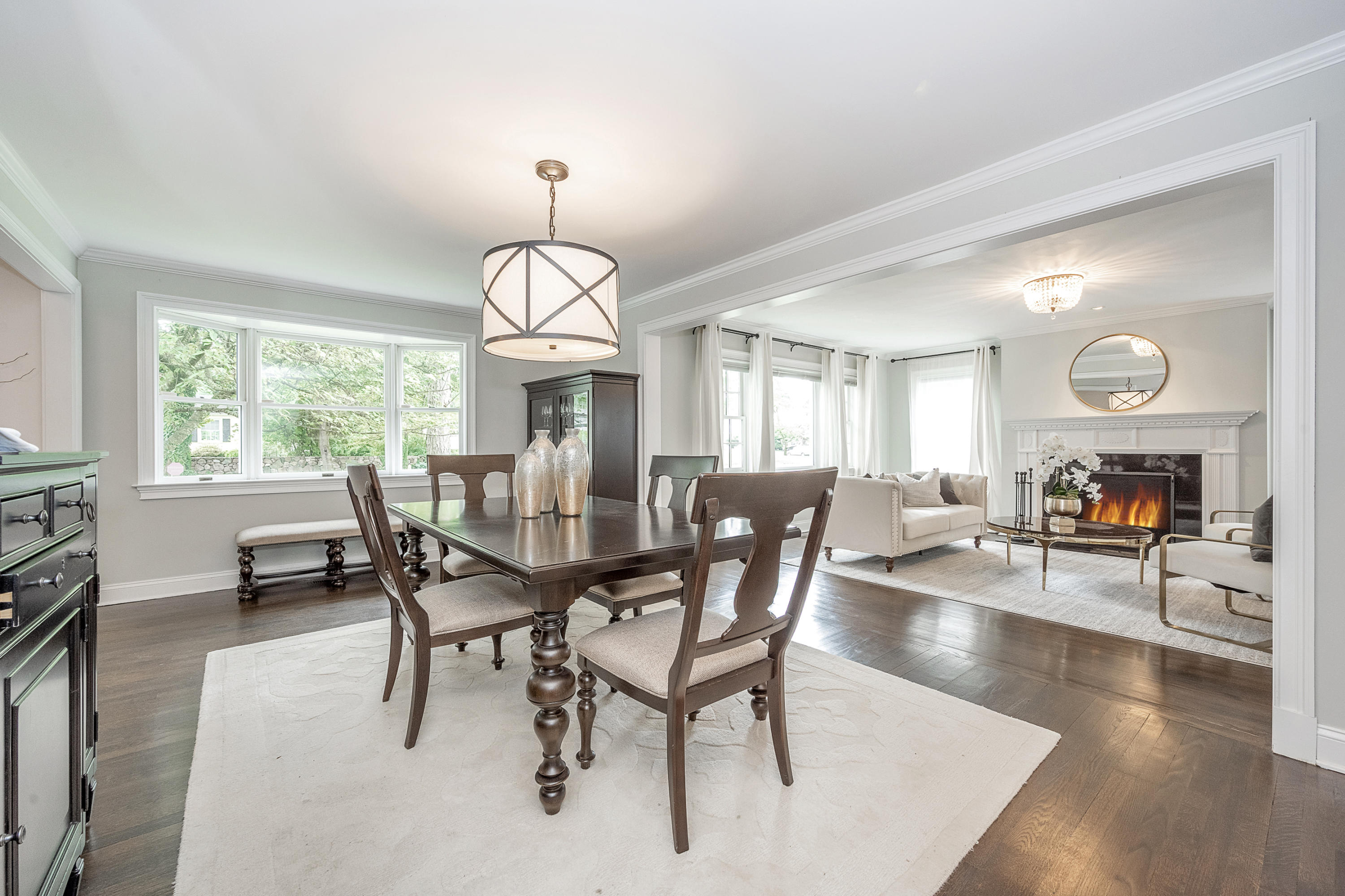 107 Hollow Tree Ridge Road Darien, CT 06820 - Photo 11 of 32 a view of a dining room with furniture window and wooden floor