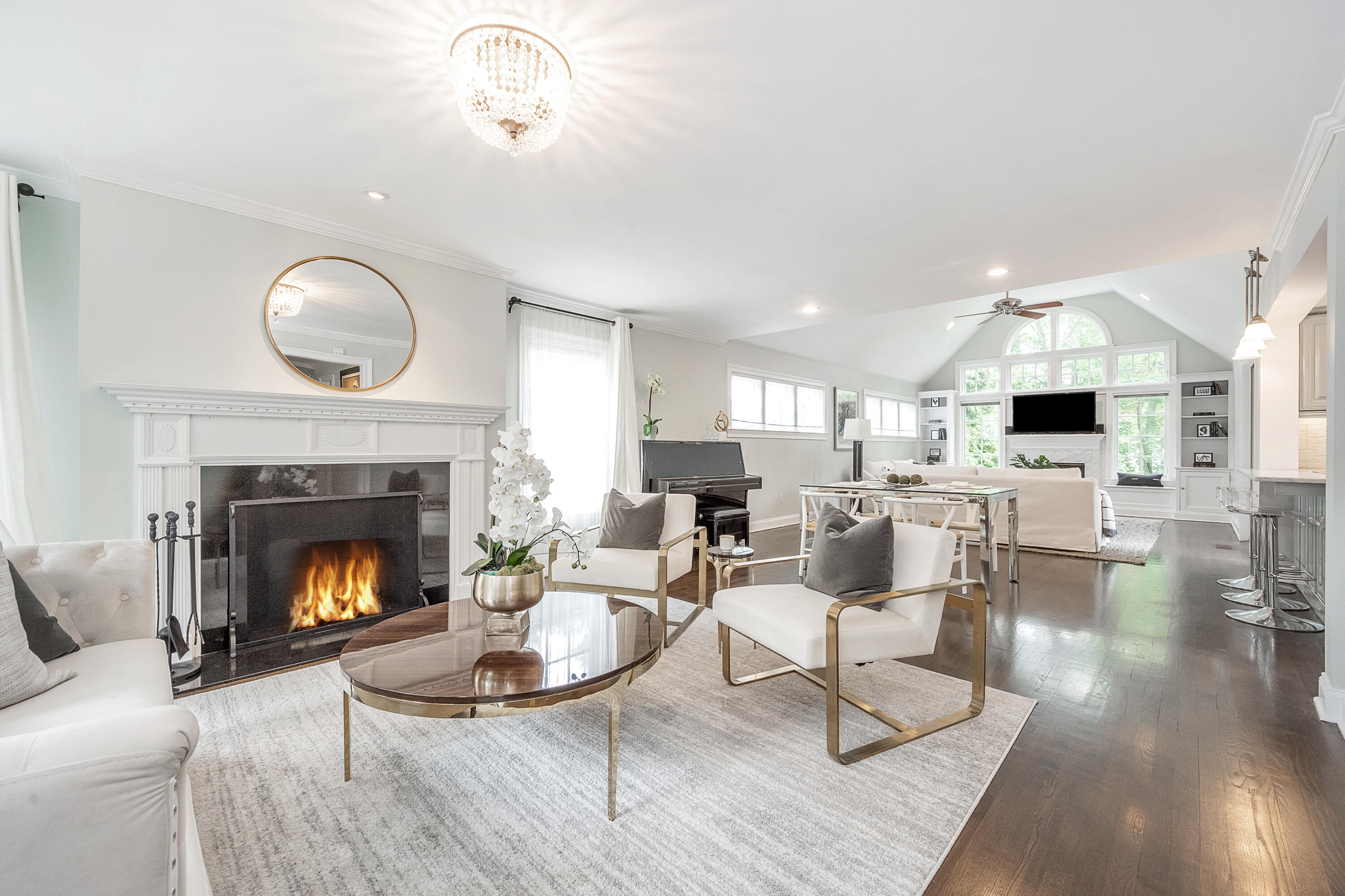 107 Hollow Tree Ridge Road Darien, CT 06820 - Photo 5 of 32 a living room with furniture a fireplace and a fireplace