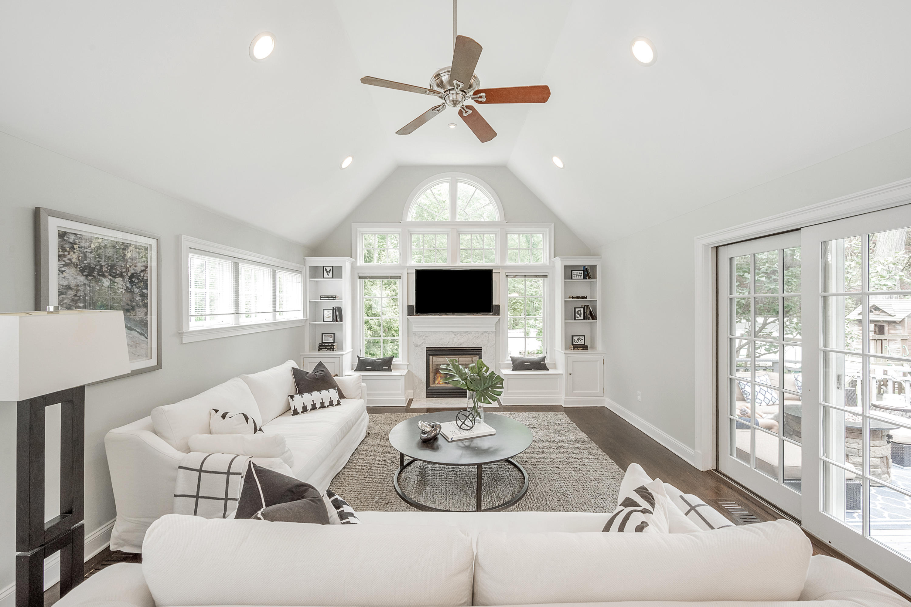 107 Hollow Tree Ridge Road Darien, CT 06820 - Photo 6 of 32 a living room with furniture fireplace and a flat screen tv