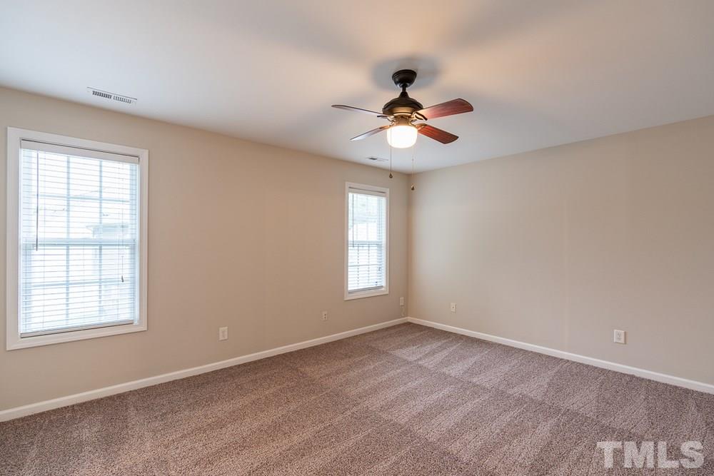 3513 Rendition Street Raleigh, NC 27610 - Photo 11 of 30 a view of room with a ceiling fan and window