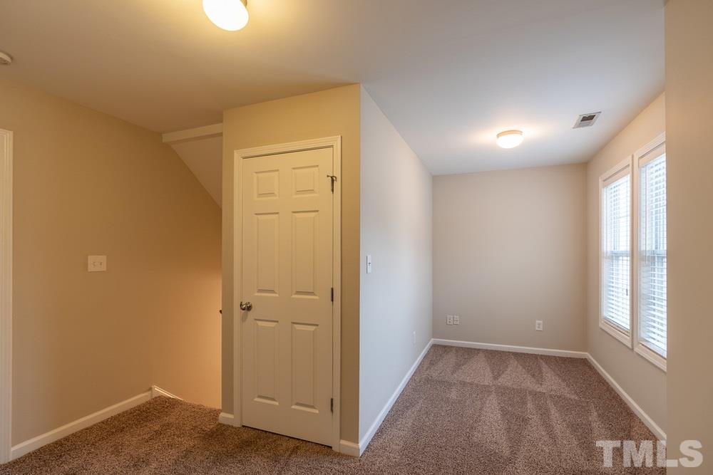 3513 Rendition Street Raleigh, NC 27610 - Photo 16 of 30 an empty room with windows and closet