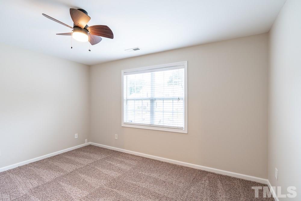 3513 Rendition Street Raleigh, NC 27610 - Photo 22 of 30 an empty room with a window