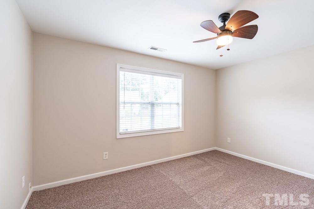 3513 Rendition Street Raleigh, NC 27610 - Photo 23 of 30 an empty room with a window
